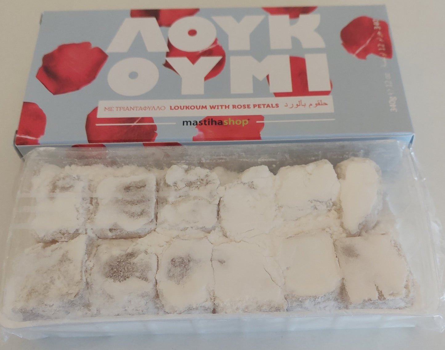 Open box of Greek rose petal loukoumi showing the contents